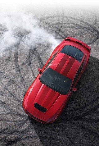 Overhead view of a 2024 Ford Mustang® model with tire tracks on pavement | Ed Morse Ford in Muscatine IA
