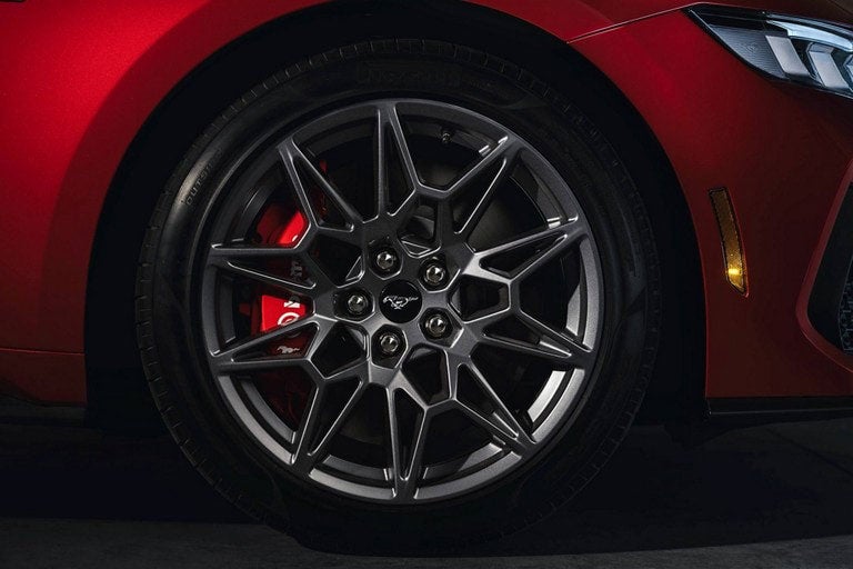 2024 Ford Mustang® model with a close-up of a wheel and brake caliper | Ed Morse Ford in Muscatine IA